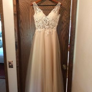 Tulle wedding dress with sheer lace bodice